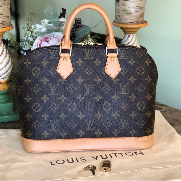 Louis Vuitton Handbags - AUTH Louis Vuitton Alma STUNNER DUSTBAG LOCK KEYS